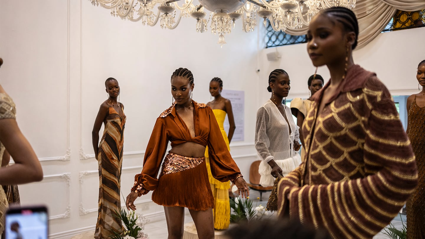 Models wearing outfits by Kilentar designer Michelle Adepoju at an installation in Temple Muse store during Lagos Fashion Week in Lagos, Nigeria on November 1, 2025.