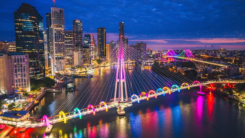 Artists Craig & Karl's installation of colourful inflatable arches over the Kangaroo Point Bridge in Brisbane for the 2025 Brisbane Festival.